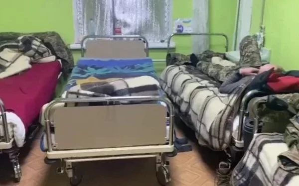 IN THE MEDICAL SECTION AT DRZUKIVKA, THE WOUNDED ARE ALREADY RECOVERING ON TRANSFERRED BEDS